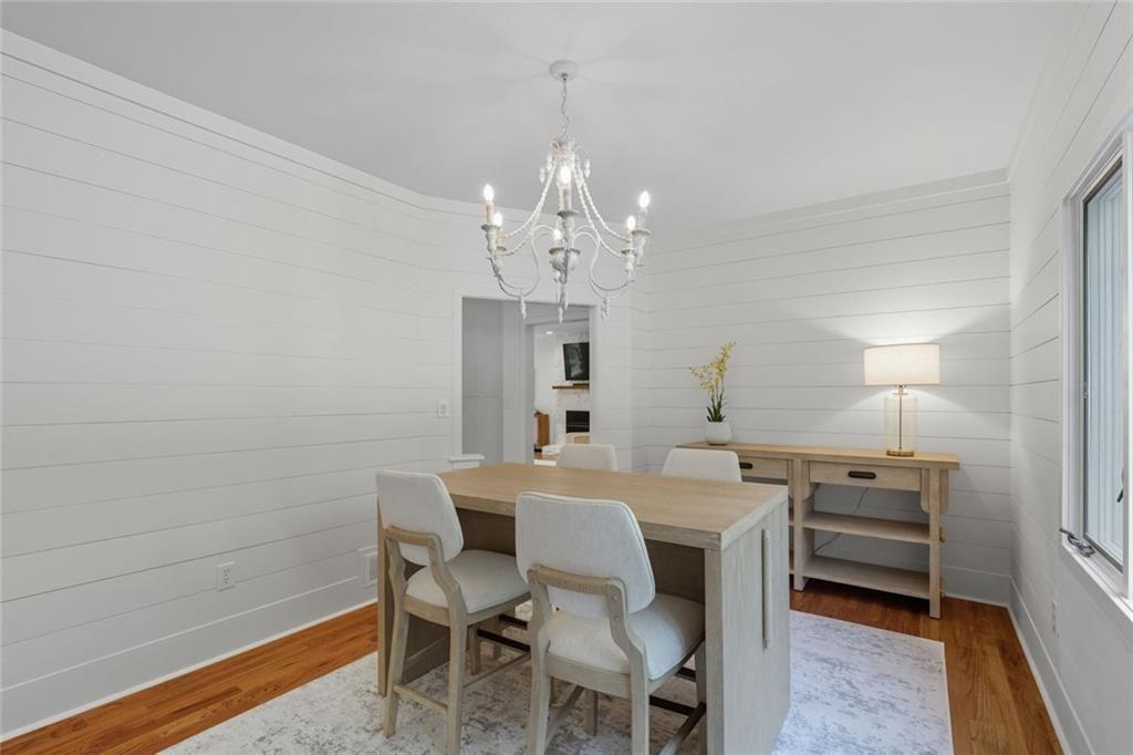 3680 Lamplighters Cove Road Gainesville, GA 30504 - Photo 26 of 88 a dining room with a table and chairs