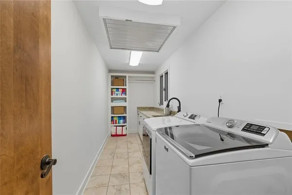 a bathroom with a bathtub and a sink