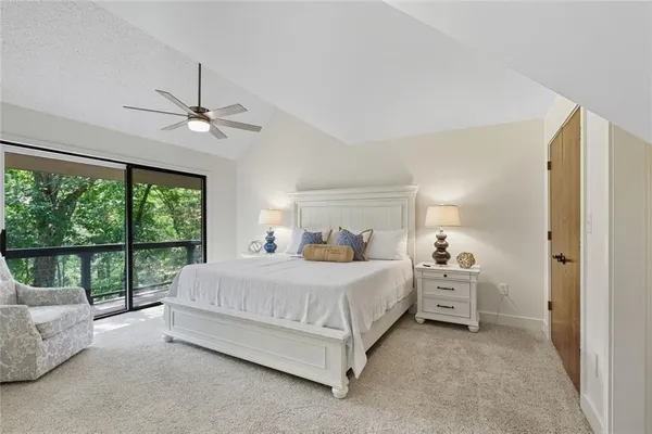 a bed room with a bed and a window