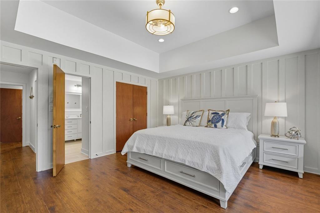 3680 Lamplighters Cove Road Gainesville, GA 30504 - Photo 57 of 88 a bedroom with a bed and a table