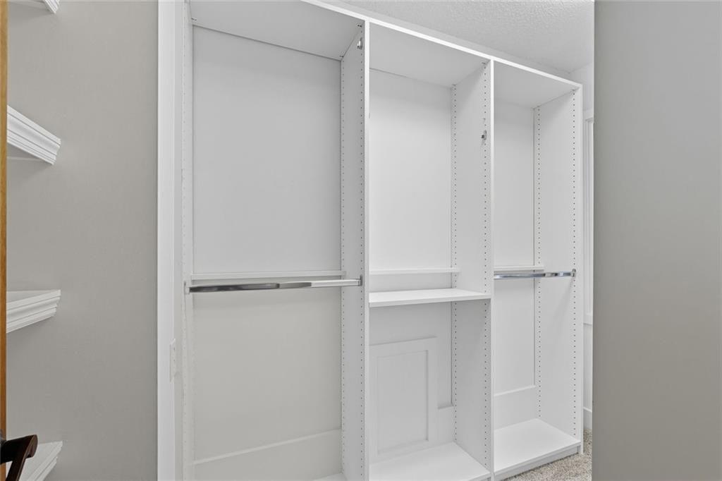 3680 Lamplighters Cove Road Gainesville, GA 30504 - Photo 64 of 88 a view of an empty walk in closet