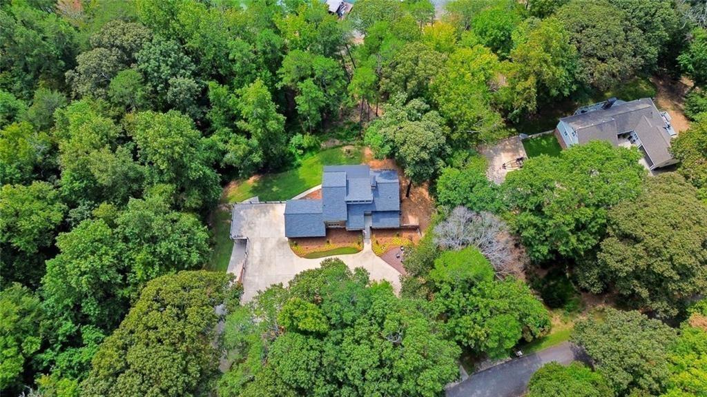 3680 Lamplighters Cove Road Gainesville, GA 30504 - Photo 79 of 88 an aerial view of a house with a garden