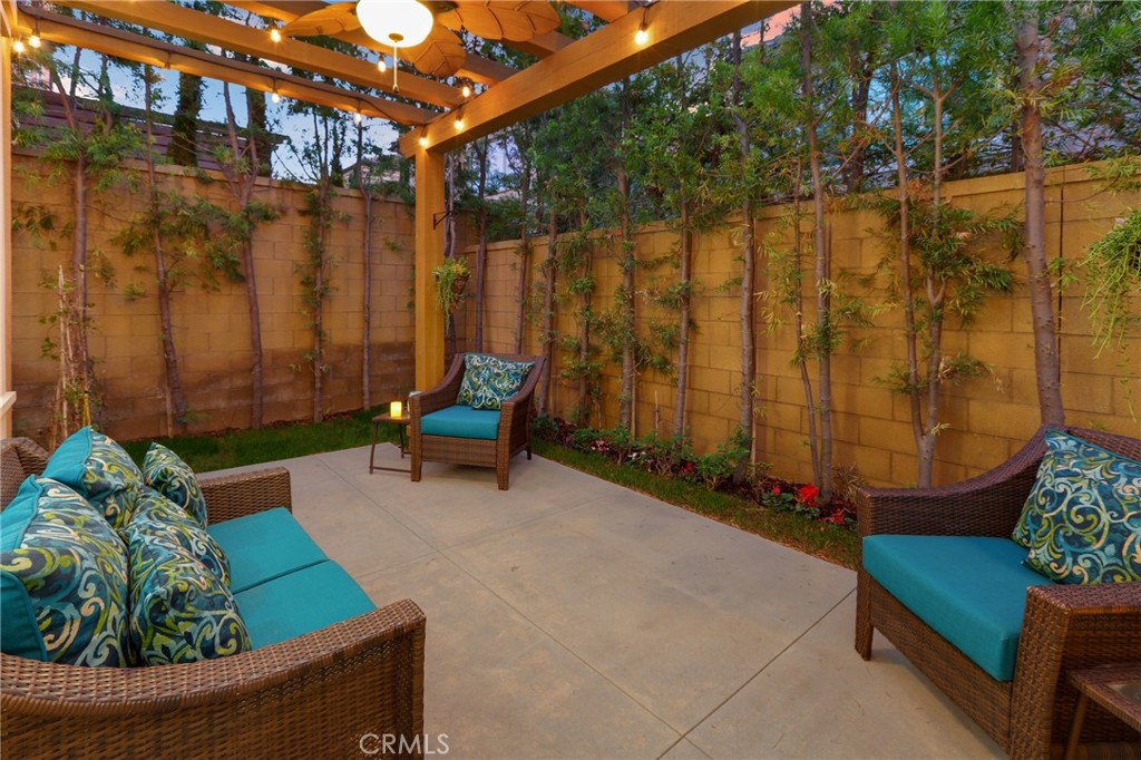 72 Brindisi Irvine, CA 92618 - Photo 36 of 48 a backyard of a house with outdoor seating