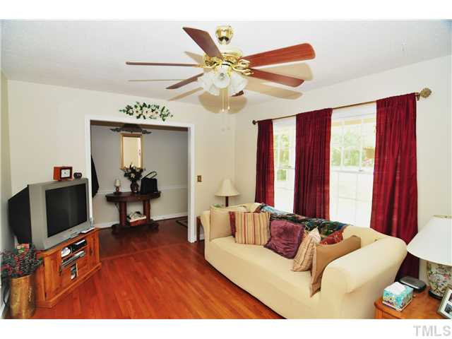 5531 McCormick Road Durham, NC 27713 - Photo 3 of 15 a living room with furniture and a flat screen tv