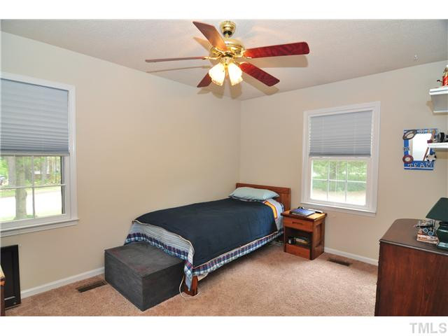 5531 McCormick Road Durham, NC 27713 - Photo 8 of 15 a living room with furniture and a window