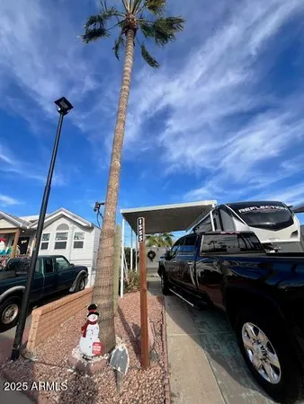 a view of a roof deck with furniture