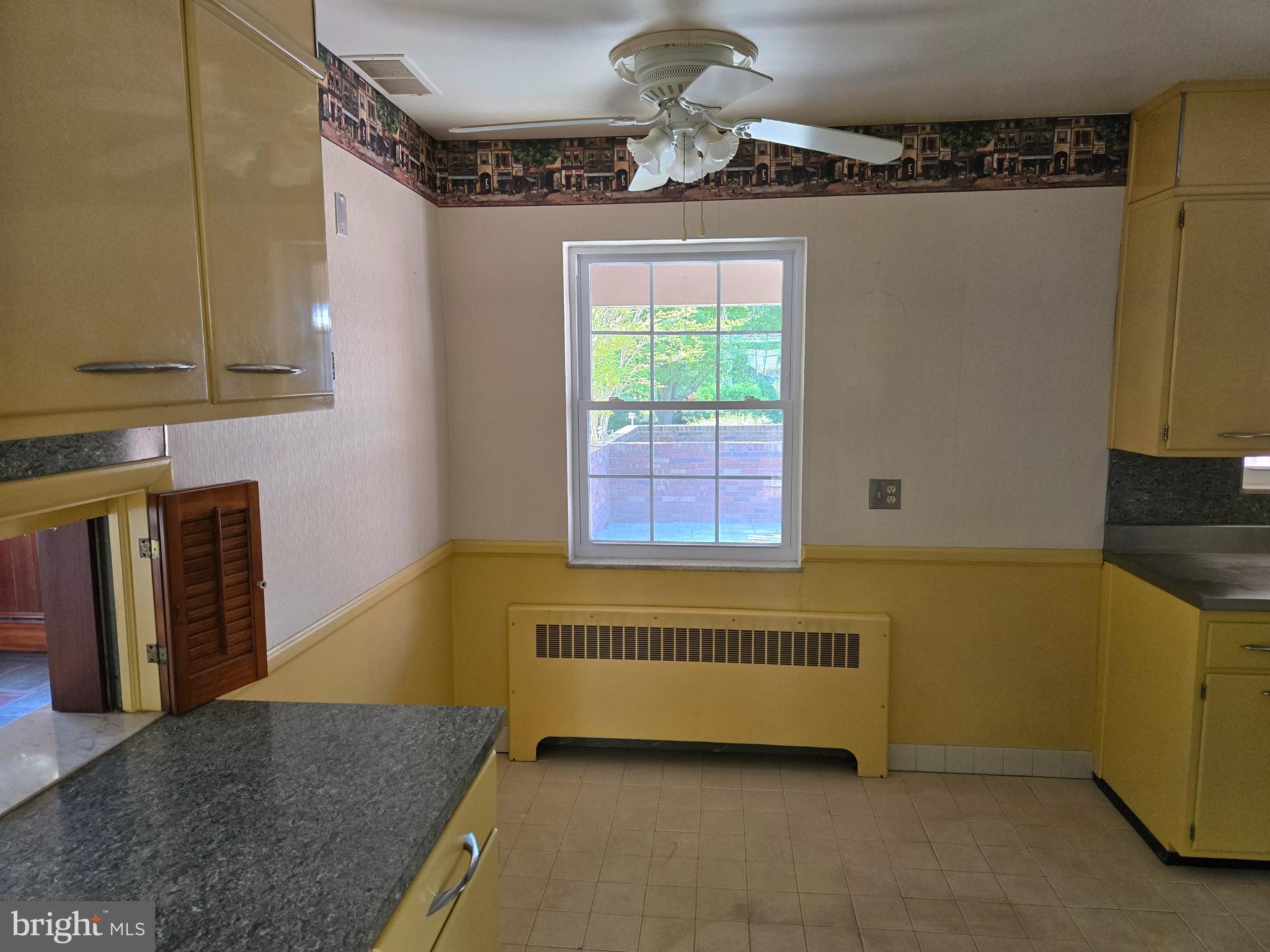 505 East Loockerman Street Dover, DE 19901 - Photo 11 of 38 a view of a livingroom with a furniture and window
