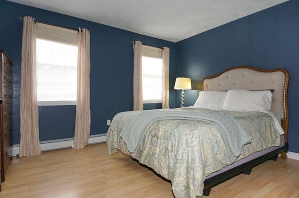 237 Acropolis Road Lowell, MA 01854 - Photo 10 of 22 a bedroom with a bed and window