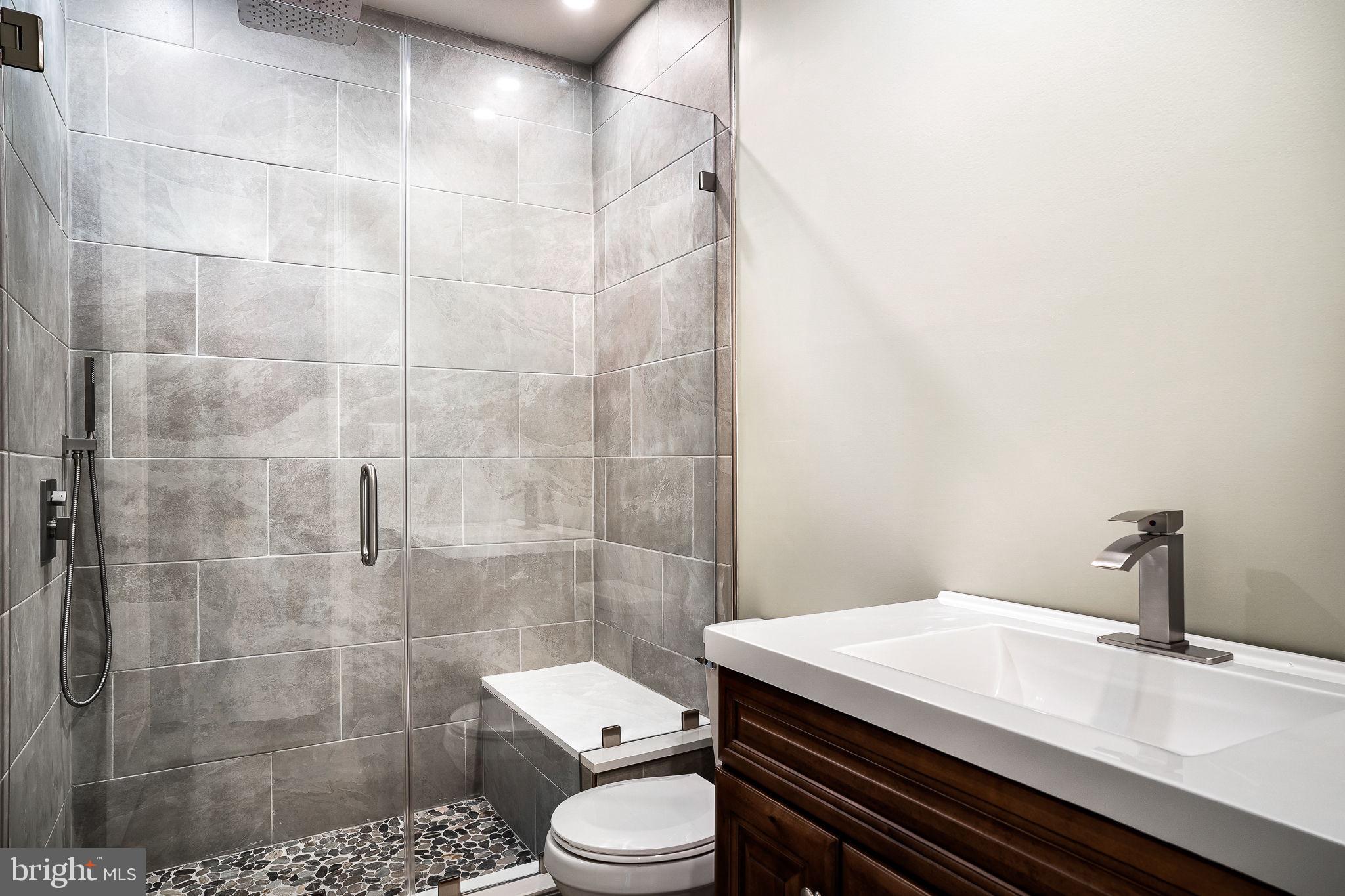 425 Canyon Road Winchester, VA 22602 - Photo 33 of 44 Lower Level Full Bathroom with Custom Tile Shower