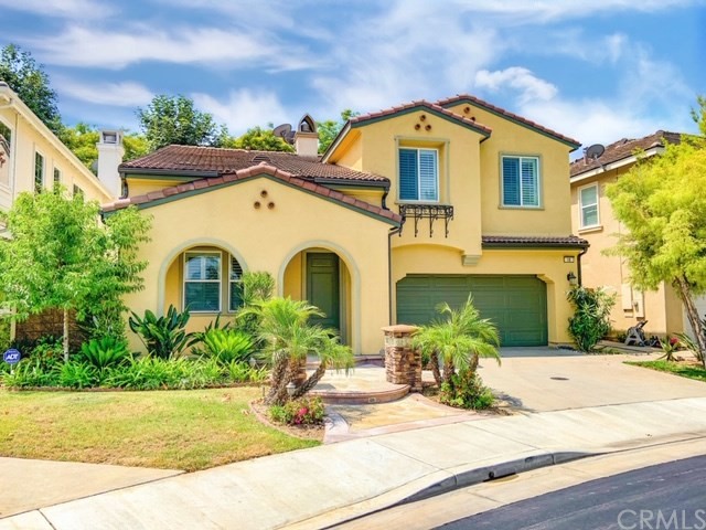 18 Sweet Fields Buena Park, CA 90620 - Photo 1 of 1 a front view of a house with garden
