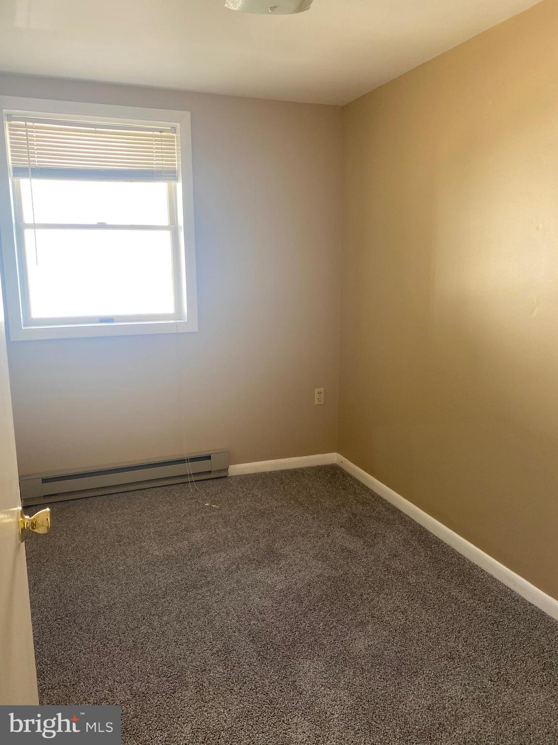 16 West Lemon Street, Unit 3 Lititz, PA 17543 - Photo 4 of 7 an empty room with a window