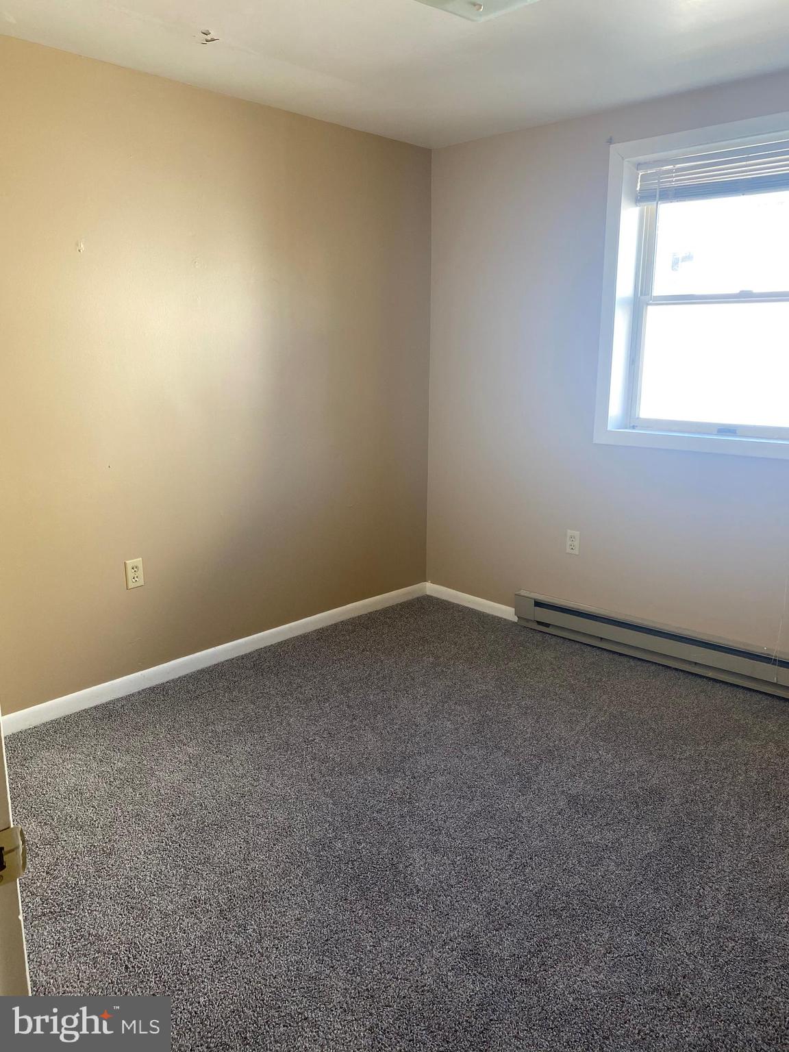 16 West Lemon Street, Unit 3 Lititz, PA 17543 - Photo 6 of 7 an empty room with a window