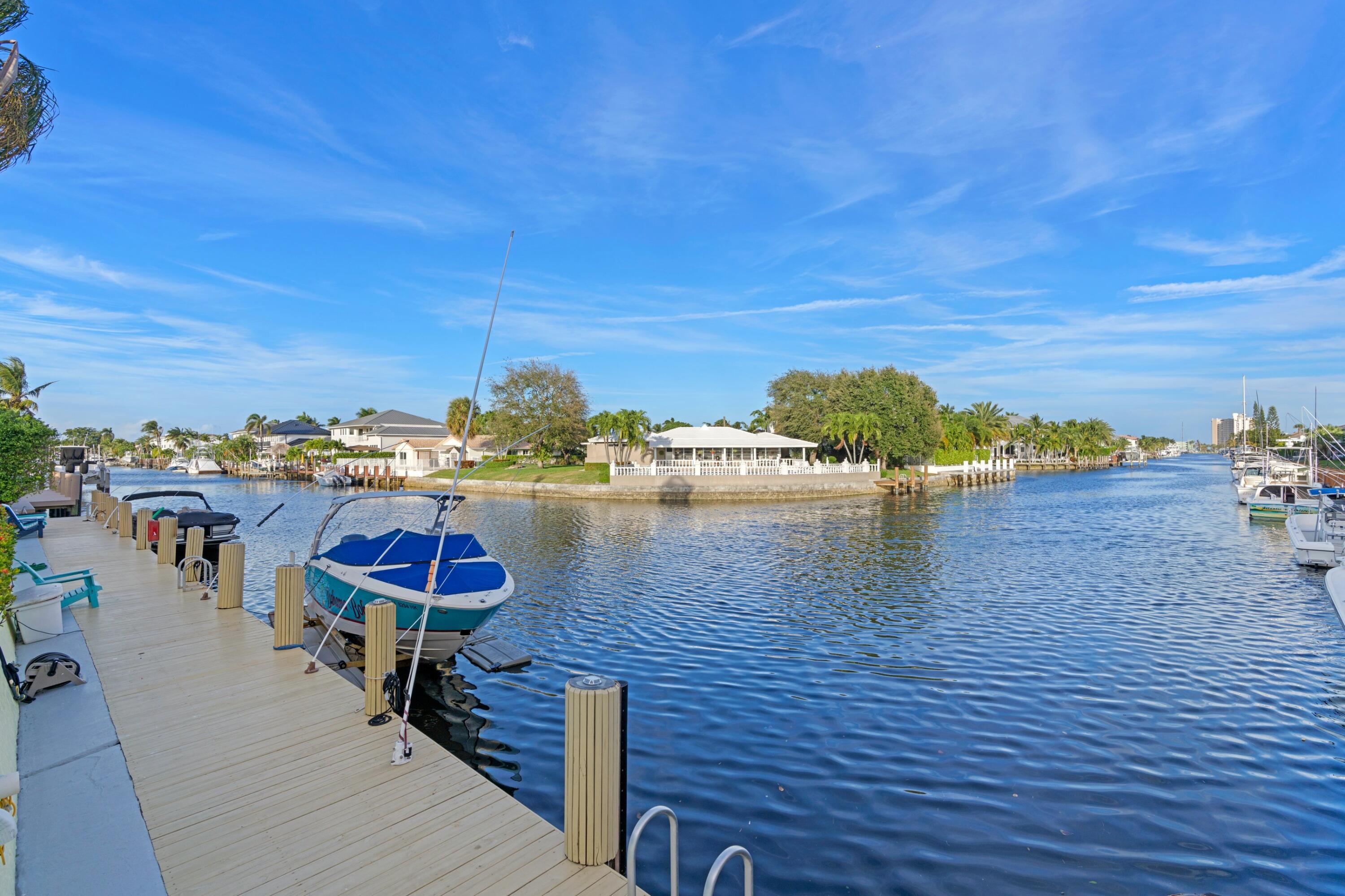 2301 Northeast 36th Street, Unit 204 Lighthouse Point, FL 33064 - Photo 3 of 20 a view of a water fountain and an ocean view