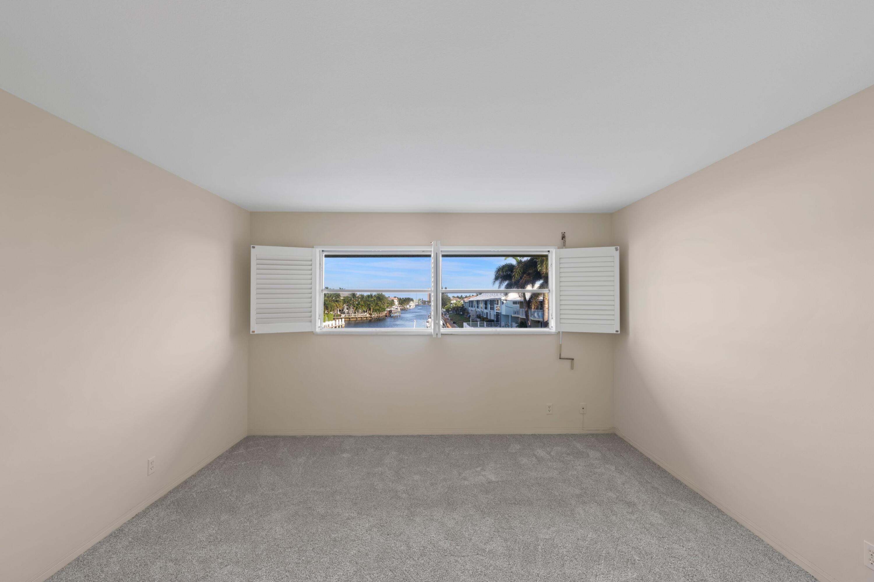 2301 Northeast 36th Street, Unit 204 Lighthouse Point, FL 33064 - Photo 9 of 20 a view of an empty room