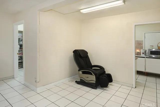 a view of a storage room with a table and chairs