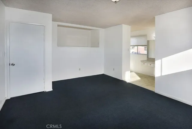 a bath room with a toilet and a bath tub