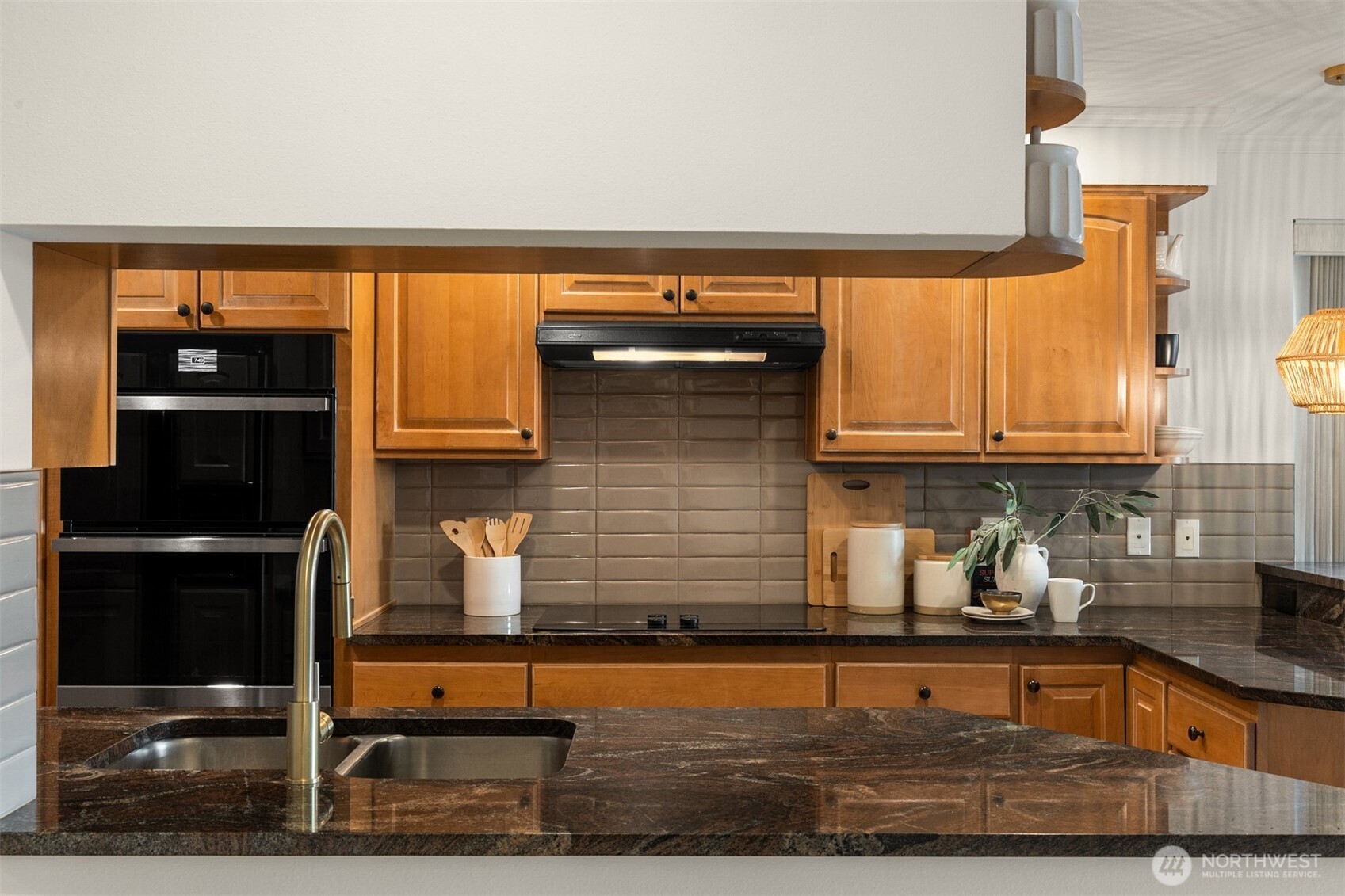 6620 Lake Washington Boulevard Northeast, Unit 101 Kirkland, WA 98033 - Photo 12 of 31 a kitchen with sink and cabinets