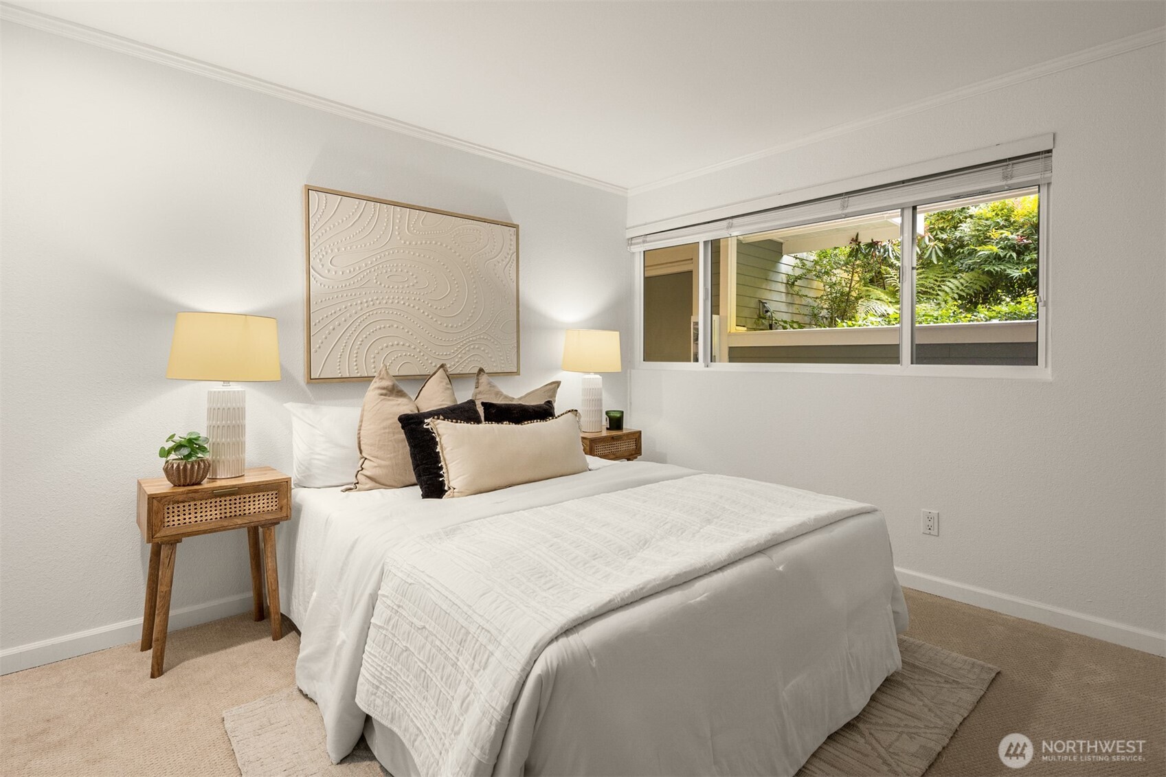 6620 Lake Washington Boulevard Northeast, Unit 101 Kirkland, WA 98033 - Photo 20 of 31 a bedroom with a bed and a lamp next to a window