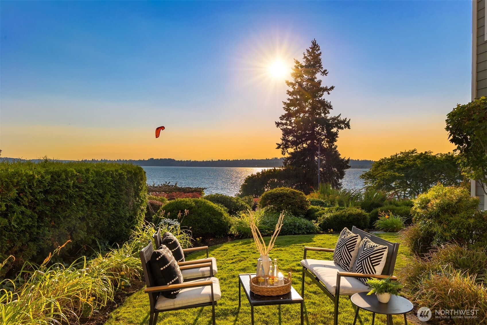 6620 Lake Washington Boulevard Northeast, Unit 101 Kirkland, WA 98033 - Photo 26 of 31 a view of a chairs and table in patio