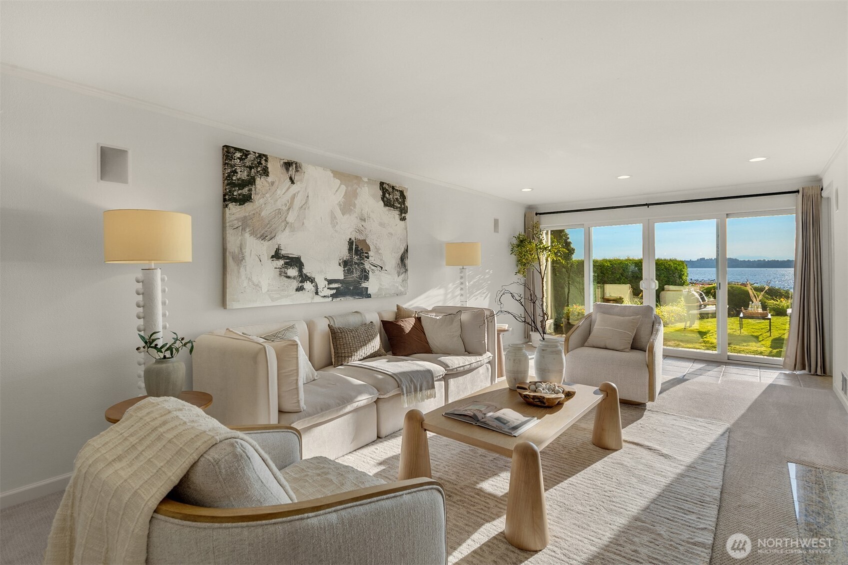 6620 Lake Washington Boulevard Northeast, Unit 101 Kirkland, WA 98033 - Photo 6 of 31 a living room with furniture and a large window