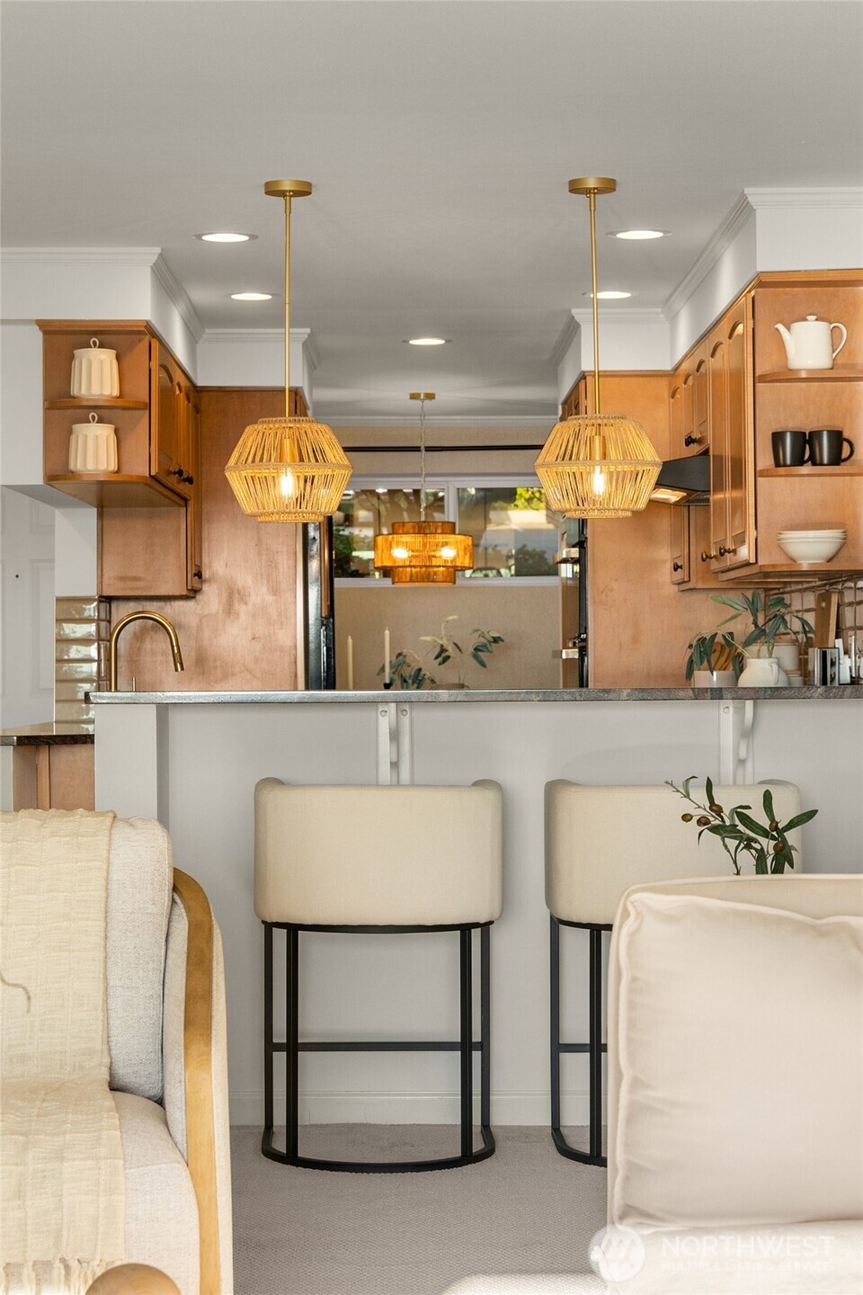 6620 Lake Washington Boulevard Northeast, Unit 101 Kirkland, WA 98033 - Photo 9 of 31 a large kitchen with a table and chairs