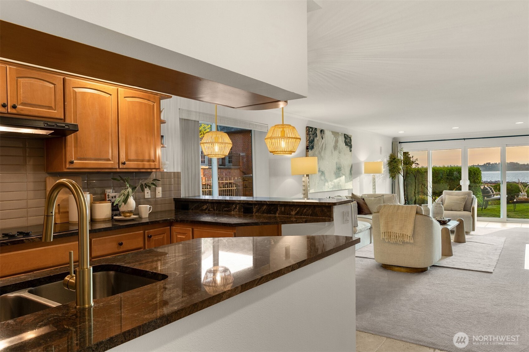 6620 Lake Washington Boulevard Northeast, Unit 101 Kirkland, WA 98033 - Photo 10 of 31 a kitchen with stainless steel appliances granite countertop a sink and a stove