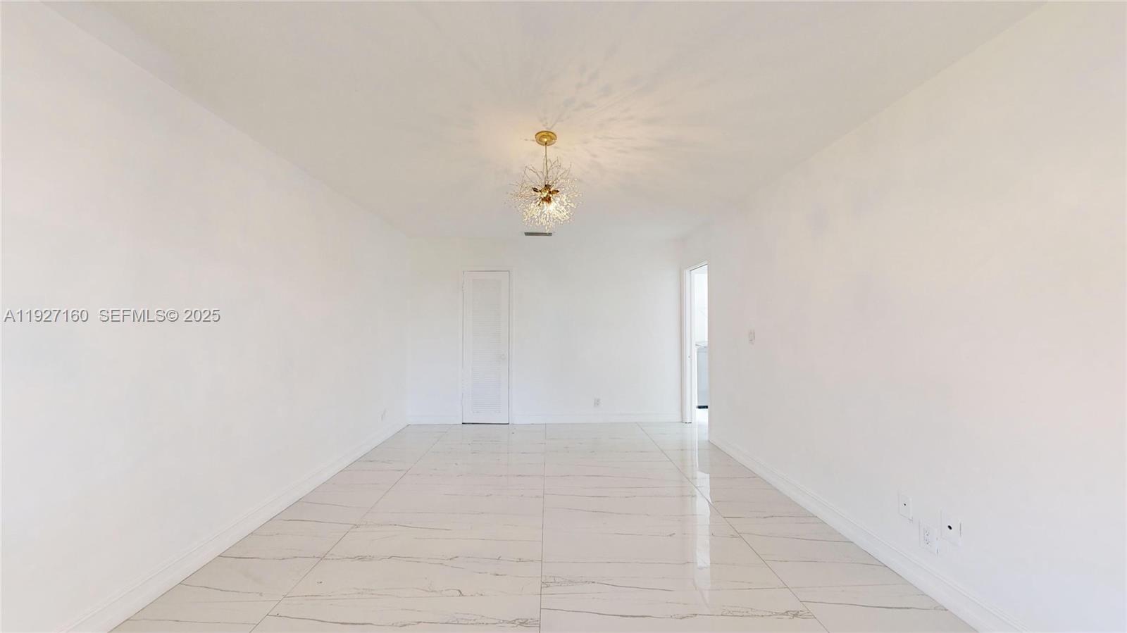 220 Southwest 8th Avenue, Unit 12 Hallandale Beach, FL 33009 - Photo 8 of 10 a view of an empty room