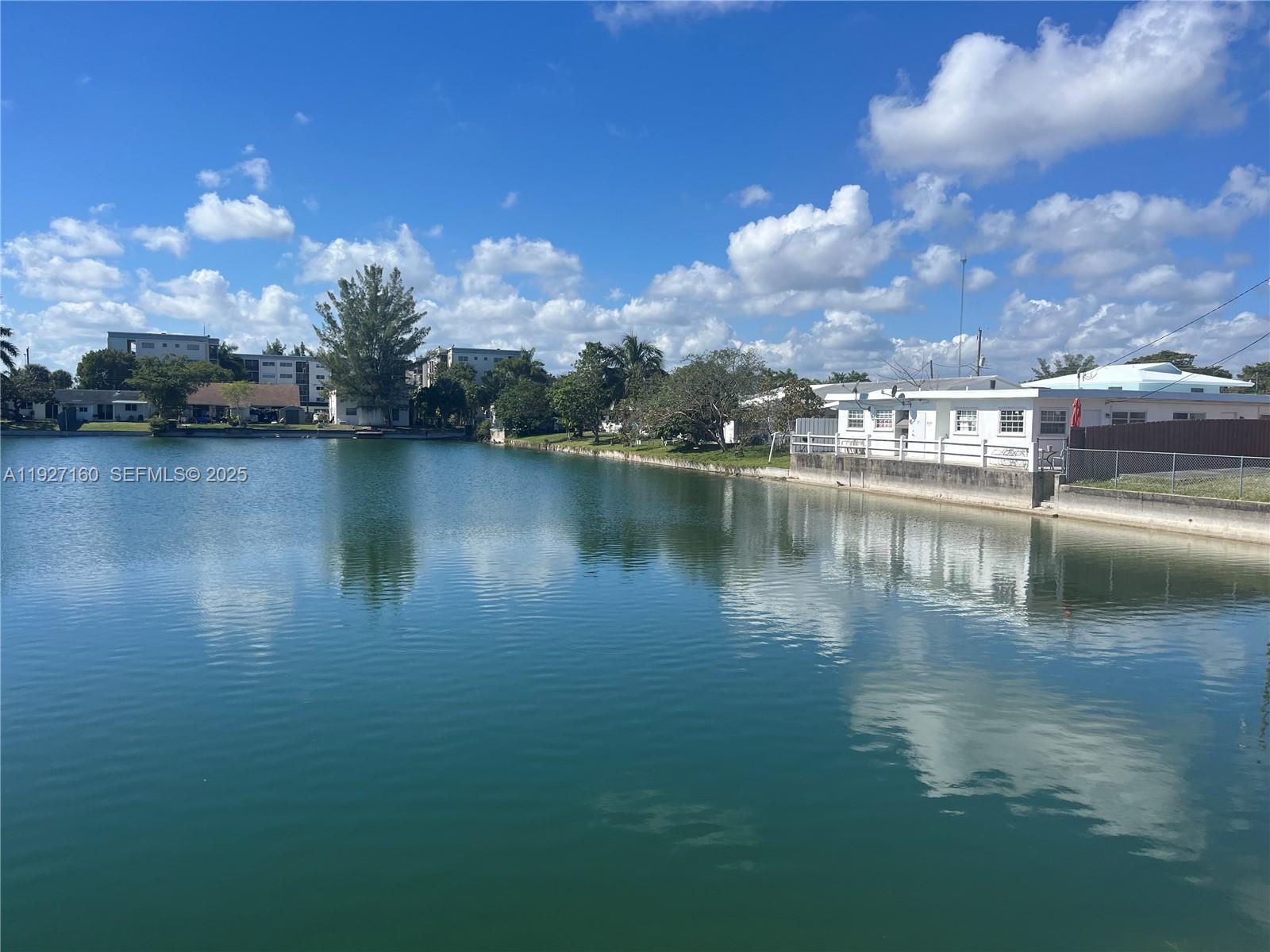 220 Southwest 8th Avenue, Unit 12 Hallandale Beach, FL 33009 - Photo 9 of 10 a view of a lake