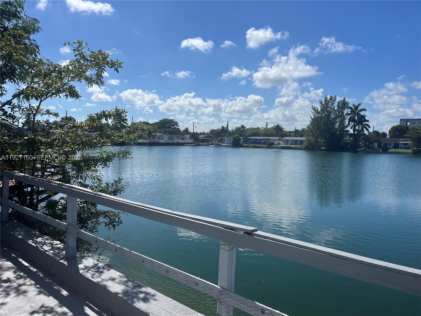 220 Southwest 8th Avenue, Unit 12 Hallandale Beach, FL 33009 - Photo 10 of 10 a view of a lake from a balcony