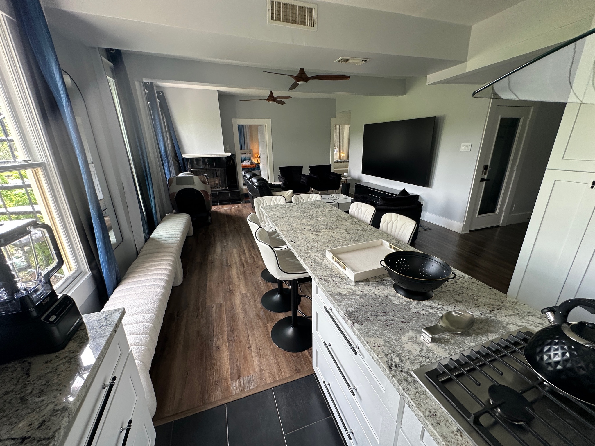 3210 Hampton Road, Unit A B C Austin, TX 78705 - Photo 21 of 42 Dining space featuring ceiling fan and dark tile patterned floors