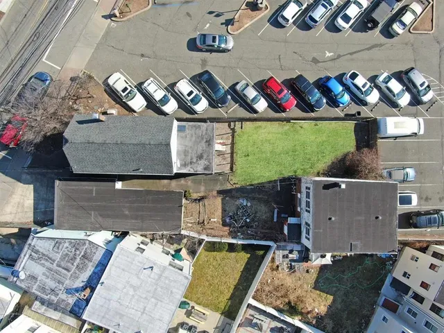 an aerial view of a building with many windows