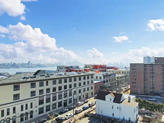 a view of a city with tall buildings