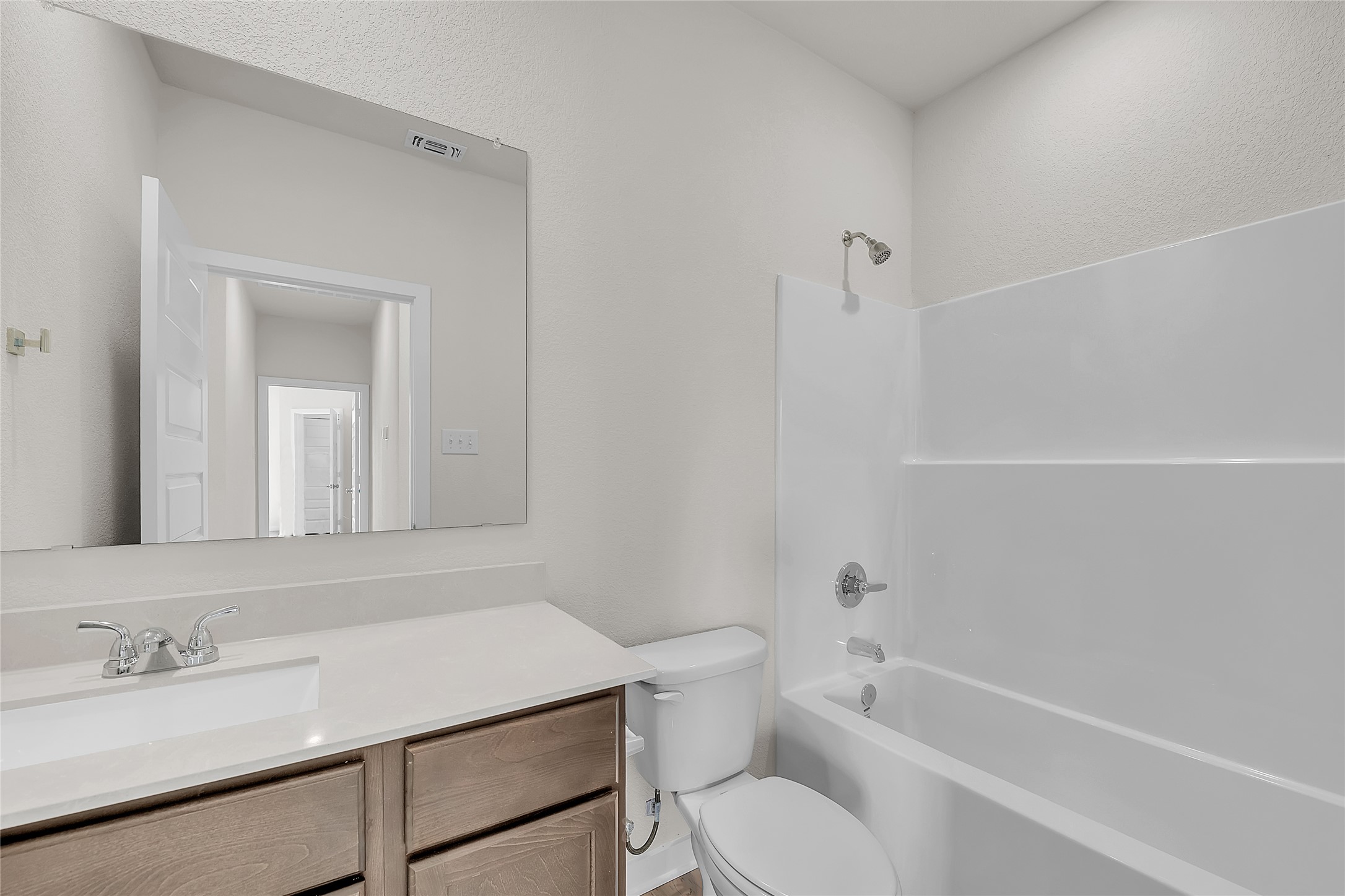 308 Boatright Boulevard Jarrell, TX 76537 - Photo 10 of 31 Full bathroom with tub / shower combination and vanity