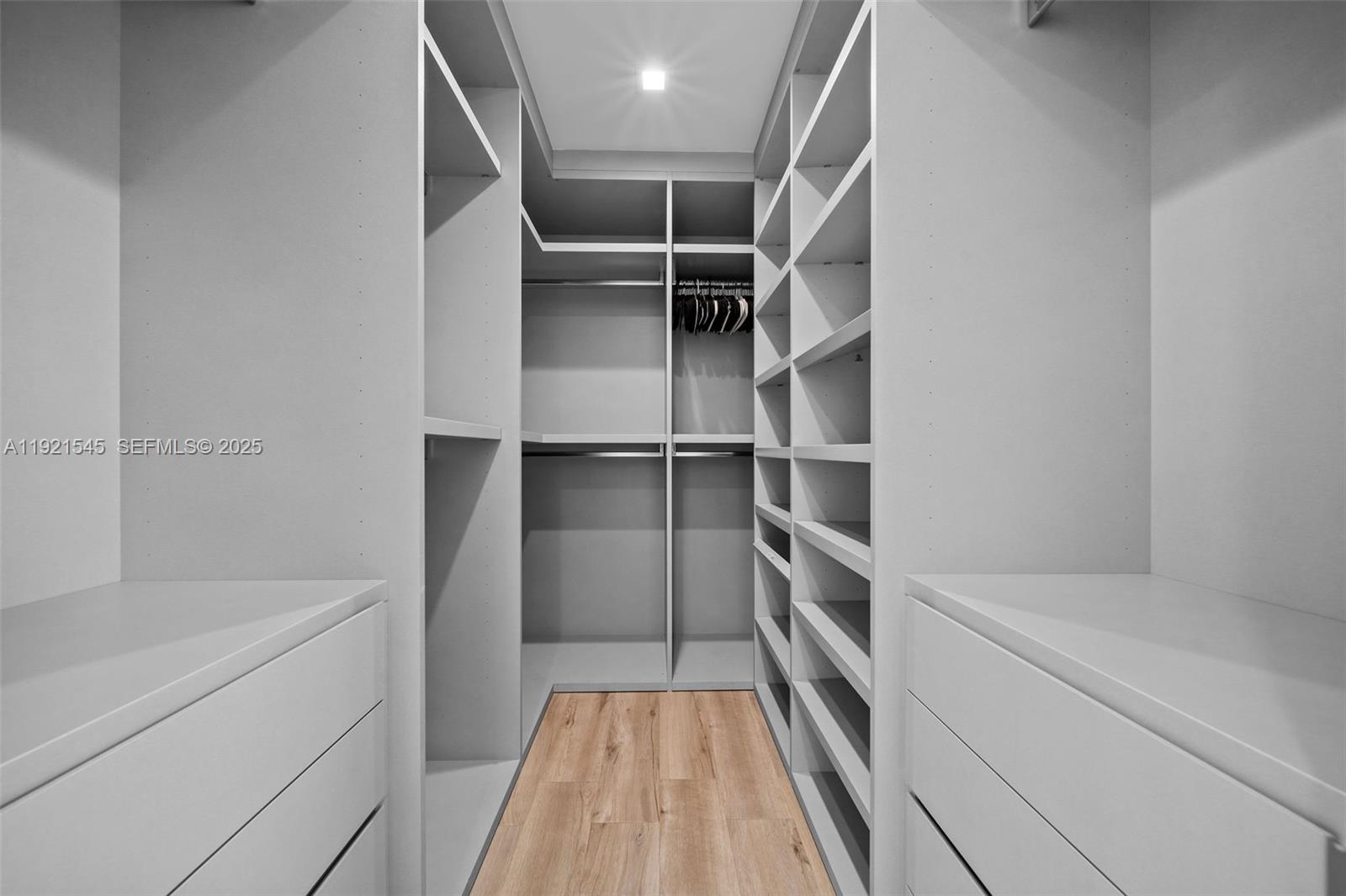 4740 Alton Road Miami Beach, FL 33140 - Photo 18 of 34 a hallway with closet