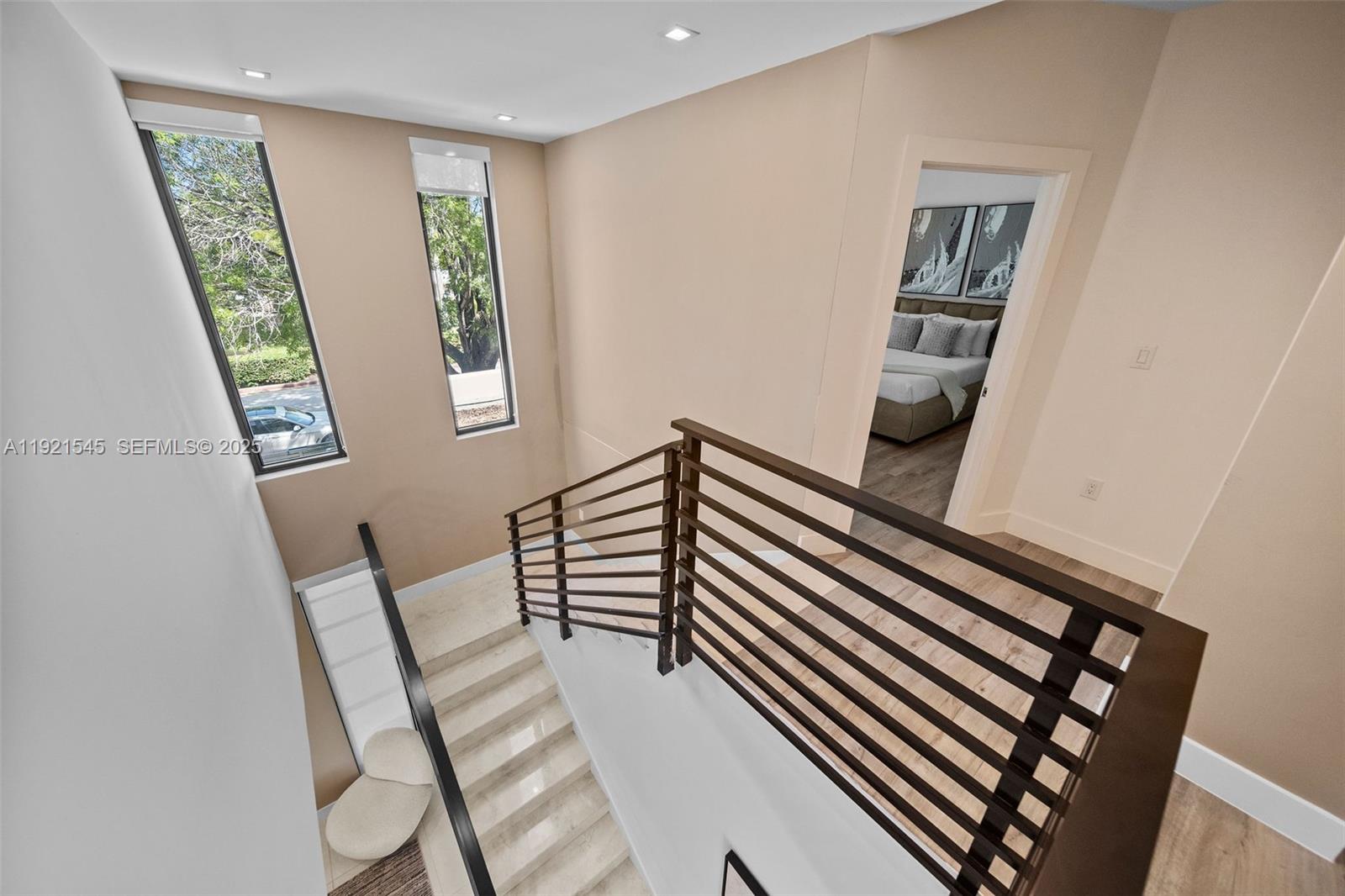 4740 Alton Road Miami Beach, FL 33140 - Photo 29 of 34 a view of a hallway with seating area