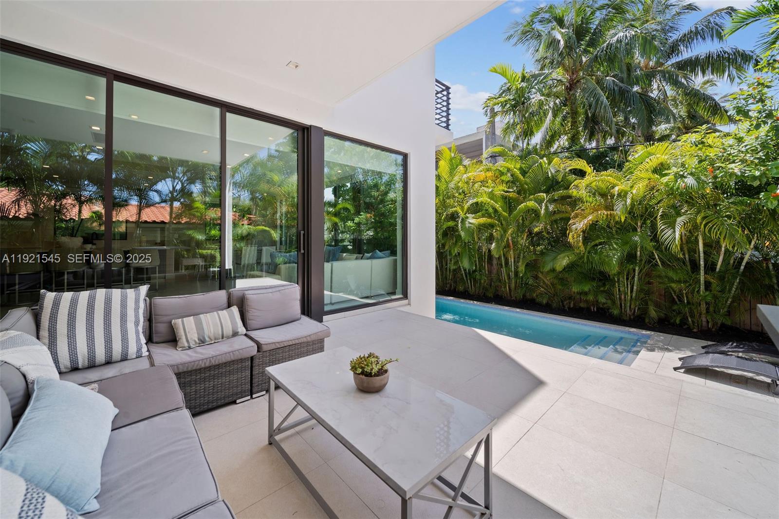 4740 Alton Road Miami Beach, FL 33140 - Photo 32 of 34 a view of an outdoor seating area