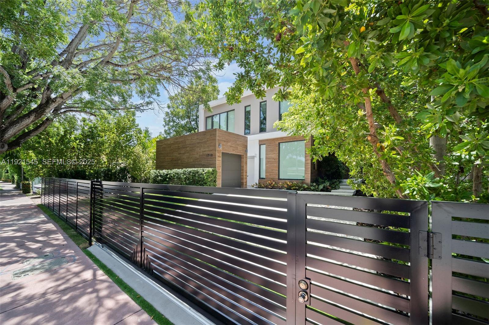 4740 Alton Road Miami Beach, FL 33140 - Photo 34 of 34 a view of a house with a tree