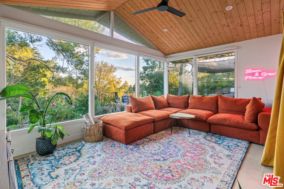 2304 Pickens Canyon Road La Crescenta, CA 91214 - Photo 11 of 37 a living room with patio furniture and a potted plant
