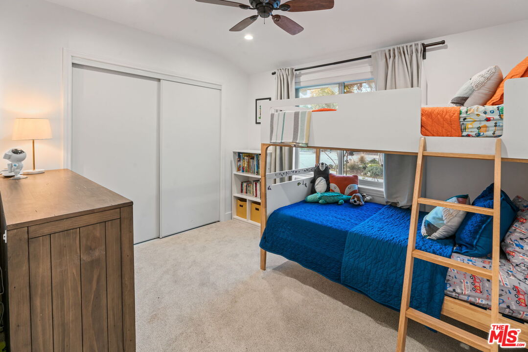 2304 Pickens Canyon Road La Crescenta, CA 91214 - Photo 14 of 37 a living room with a bed and a dresser