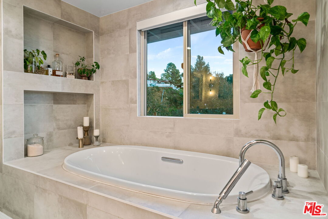 2304 Pickens Canyon Road La Crescenta, CA 91214 - Photo 22 of 37 a bath tub sitting in a bathroom next to a window