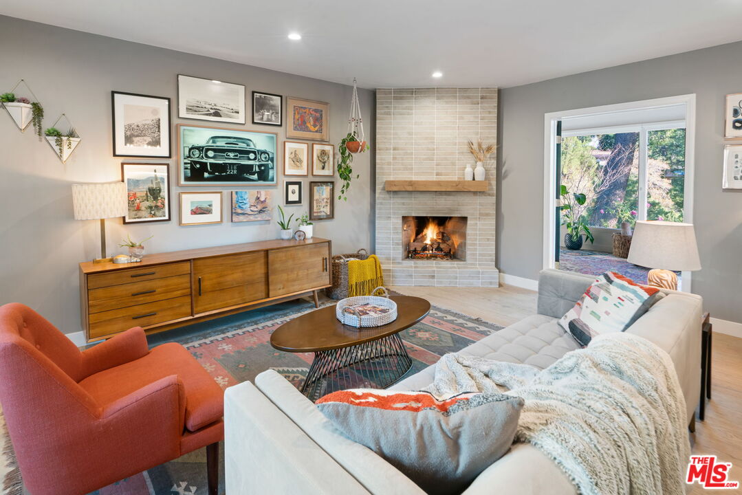 2304 Pickens Canyon Road La Crescenta, CA 91214 - Photo 4 of 37 a living room with furniture and a fireplace