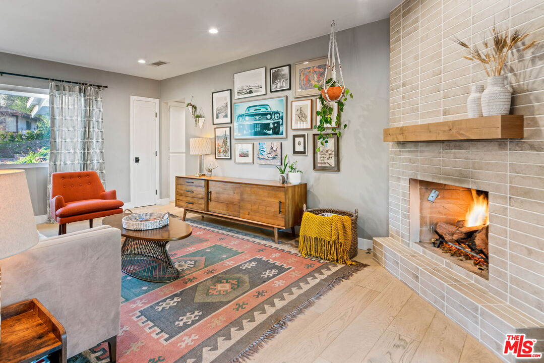 2304 Pickens Canyon Road La Crescenta, CA 91214 - Photo 5 of 37 a living room with furniture and a fireplace