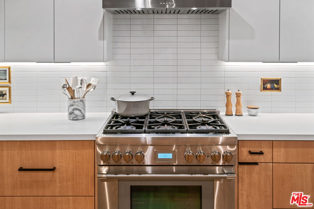 2304 Pickens Canyon Road La Crescenta, CA 91214 - Photo 9 of 37 a stove top oven sitting inside of a kitchen