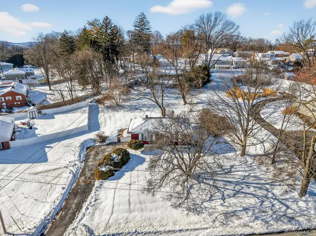 a view of a backyard of the house