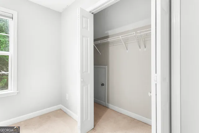 a bedroom with furniture and a bed