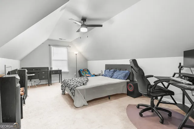 a living room with furniture and window