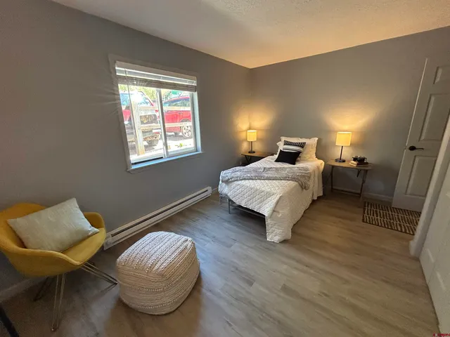 a room with a bed and a chair