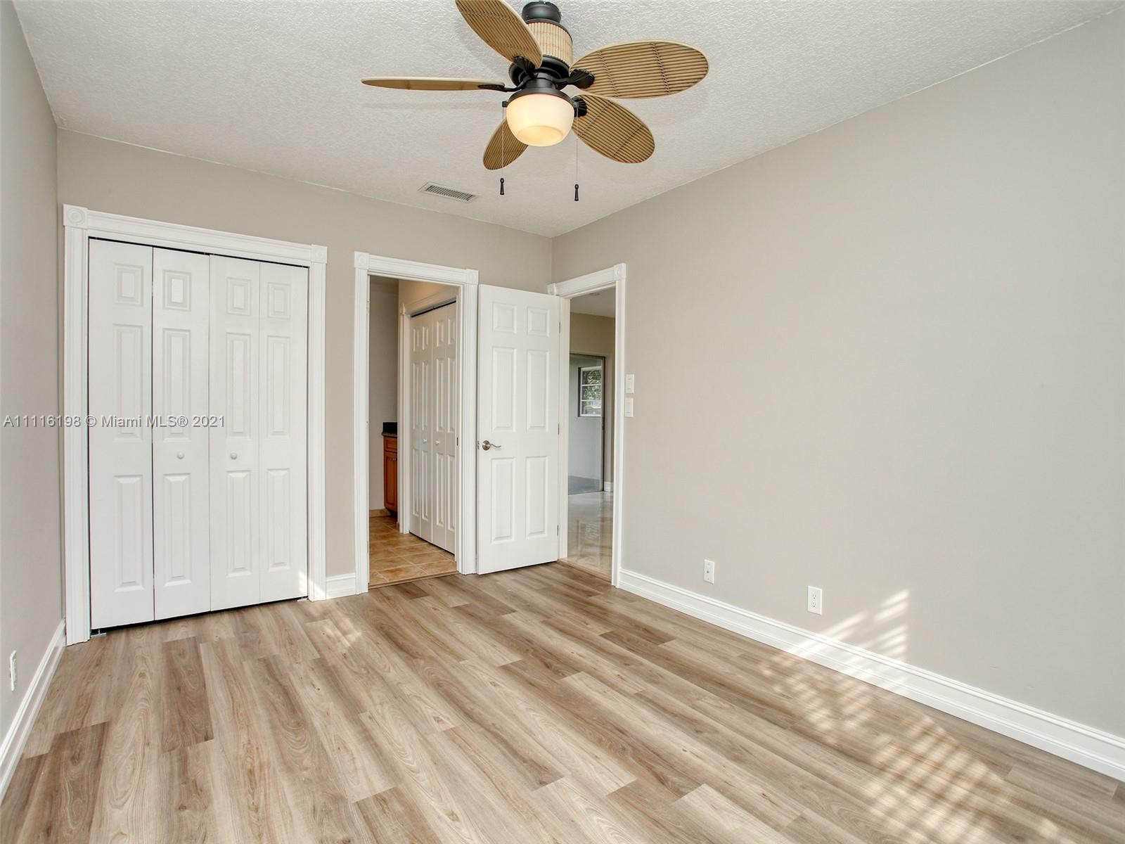 49 Southwest 12th Avenue Boca Raton, FL 33486 - Photo 14 of 30 a view of a room with a ceiling fan