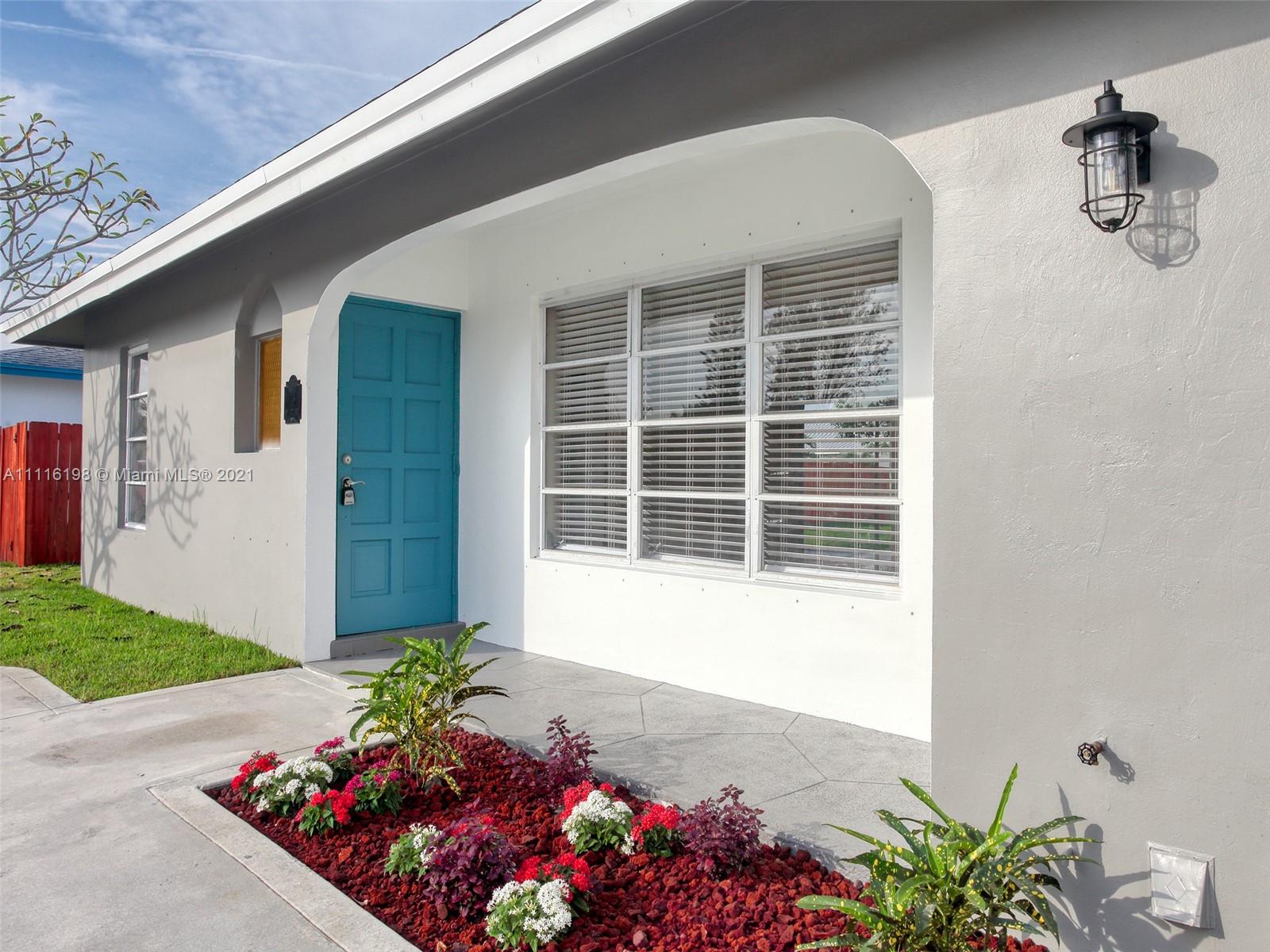 49 Southwest 12th Avenue Boca Raton, FL 33486 - Photo 4 of 30 a front view of a house
