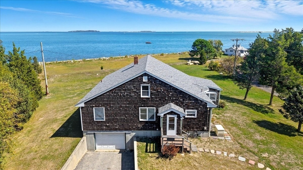 70 Hedge Road Plymouth, MA 02360 - Photo 3 of 41 a view of a house with a yard
